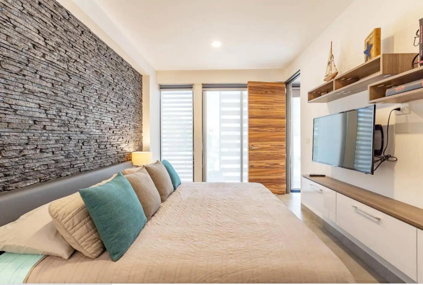 Tolok condo at Icono Playa