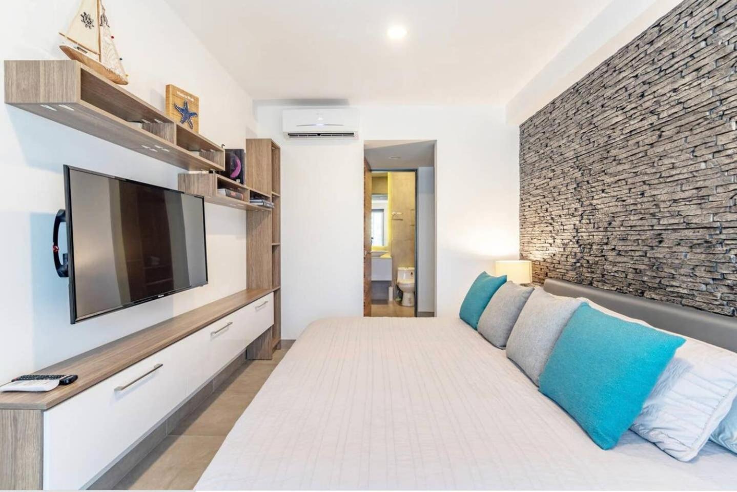 Tolok condo at Icono Playa