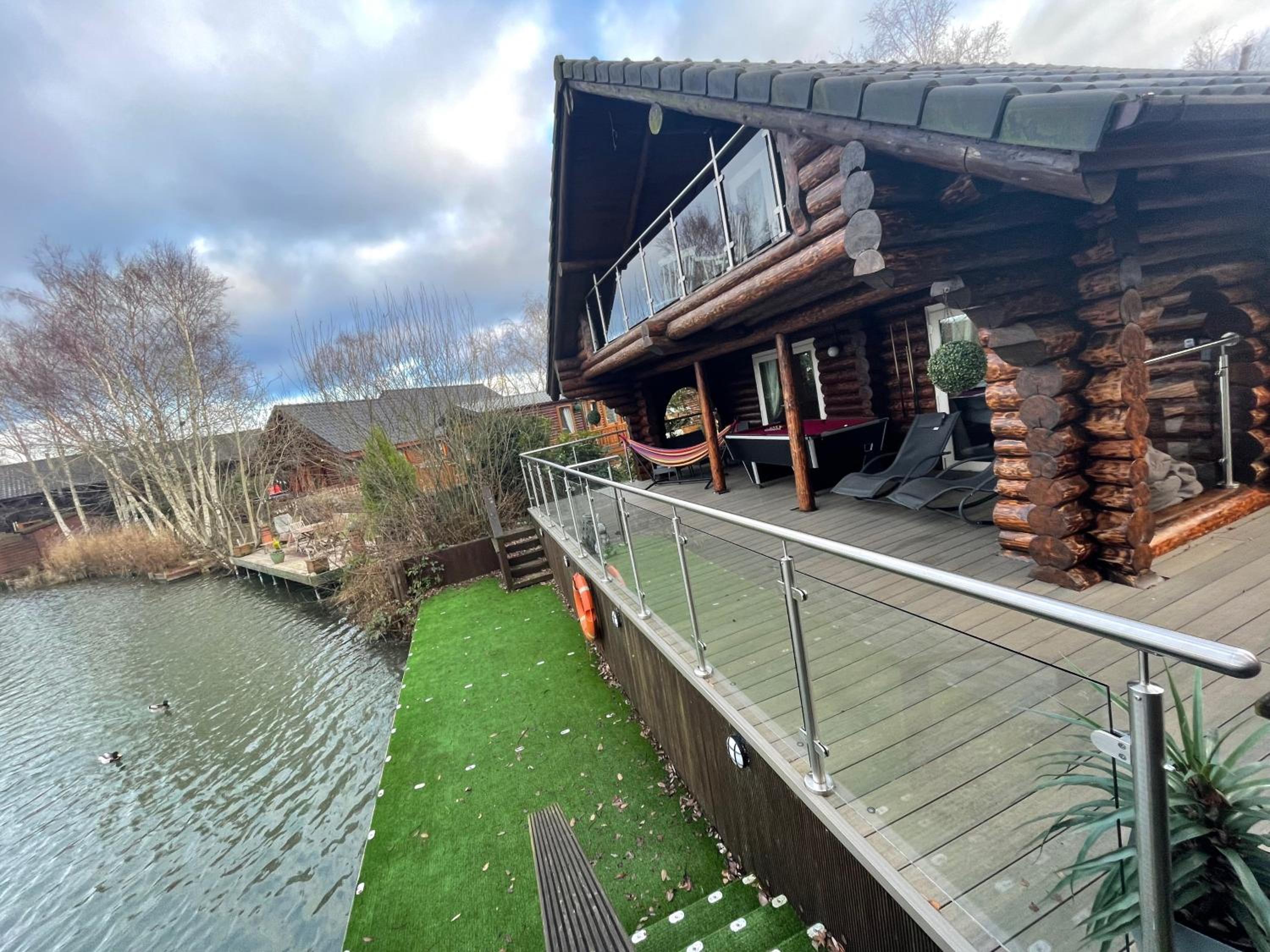 Woodpecker Log Cabin with hot tub, pizza oven bbq entertainment area, lakeside with private fishing peg situated at Tattershall Lakes view 2