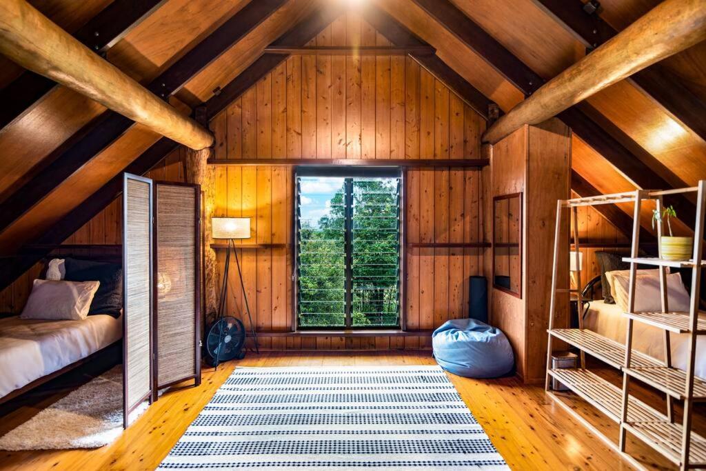 Treetops Sanctuary - Luxury Treehouse pole home