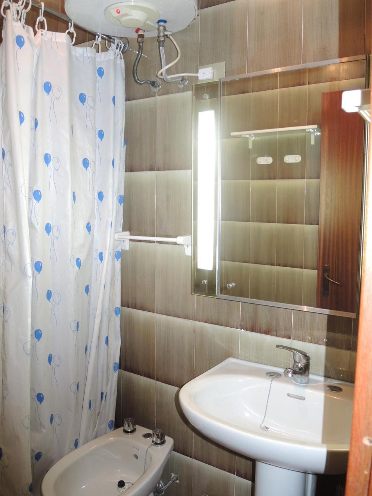 Warm two-room flat with balcony near the beach