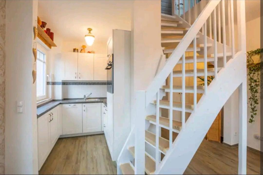 Dachgeschosswohnung Scharbeutz mit Garten