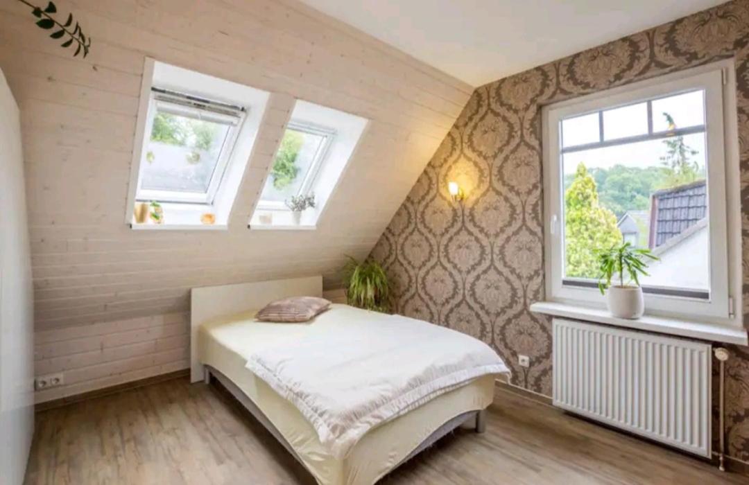 Dachgeschosswohnung Scharbeutz mit Garten