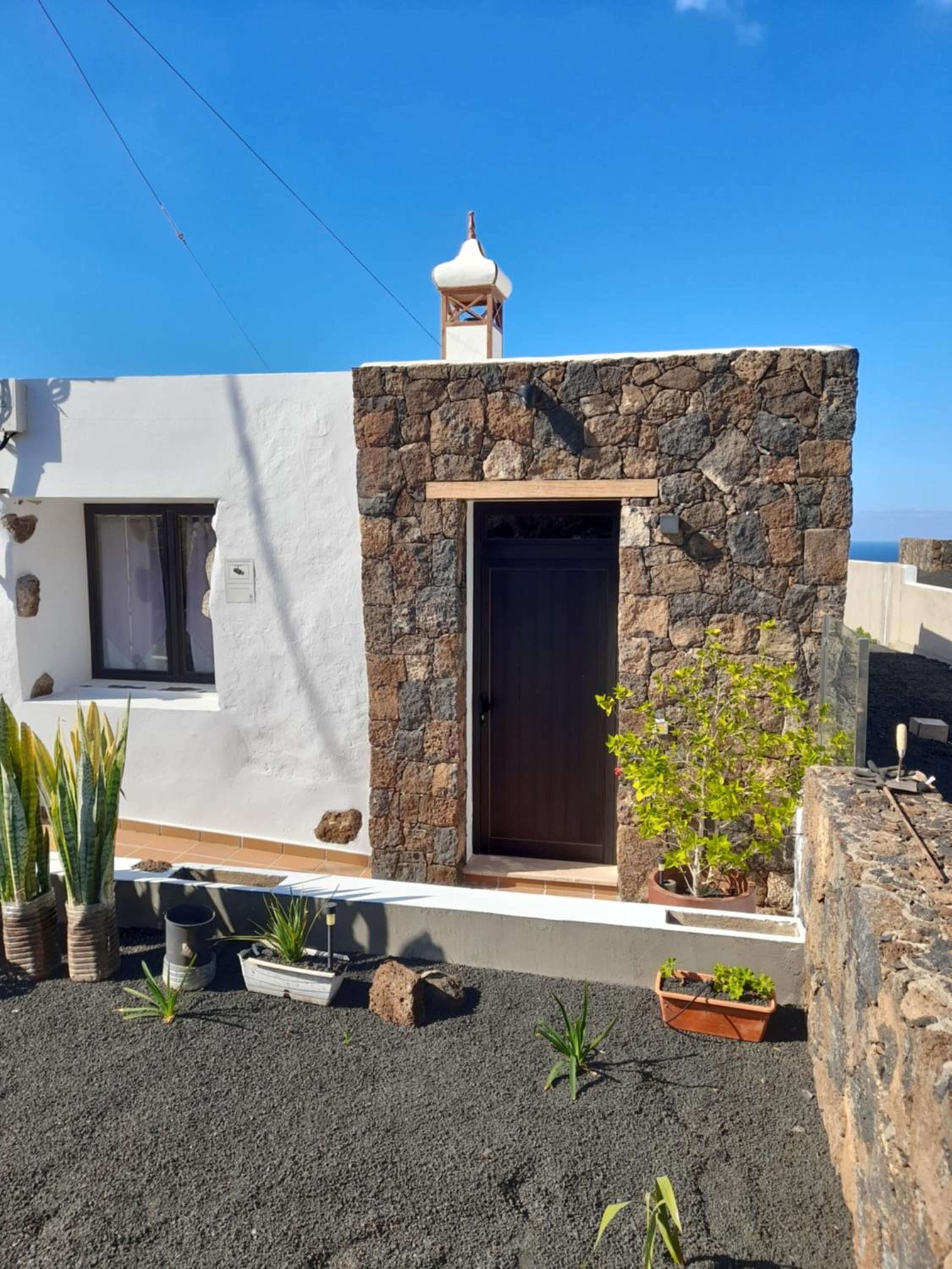 Apartamento con terraza y jardín