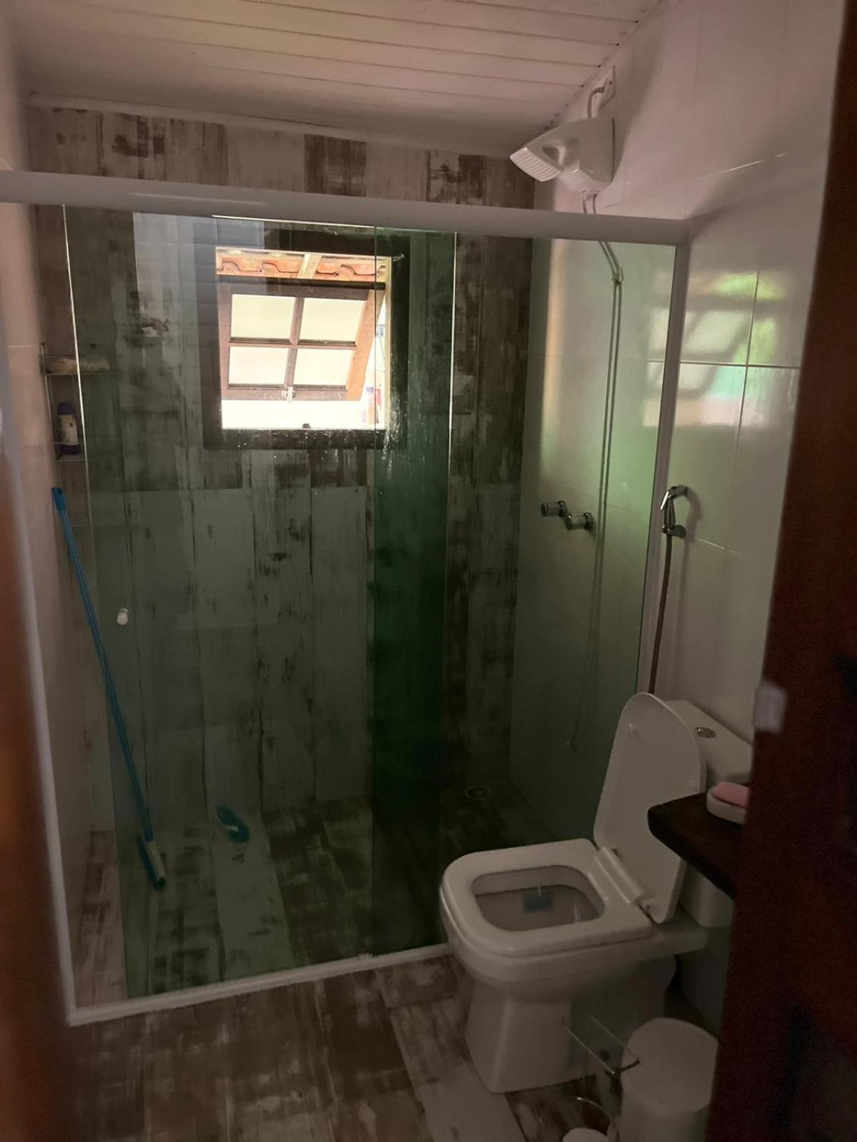 Casa na praia de Camburi em condomínio com piscina aquecida