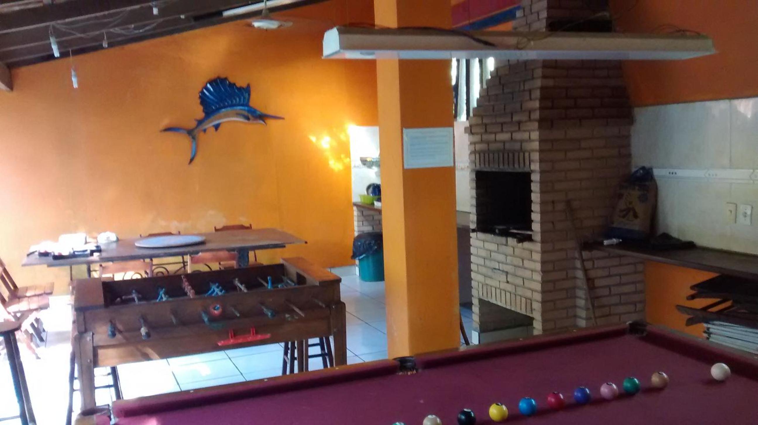 Casa na praia de Camburi em condomínio com piscina aquecida