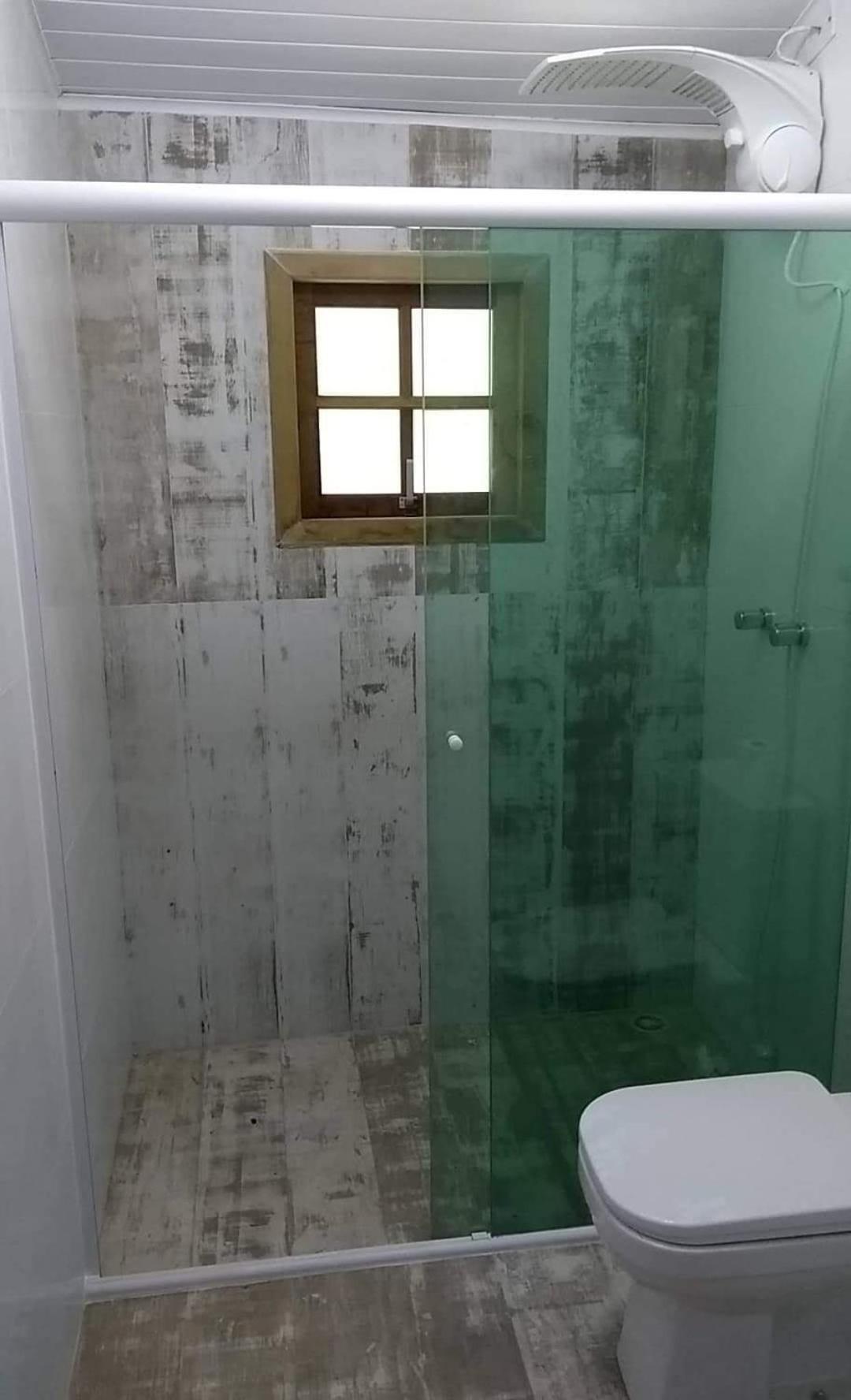 Casa na praia de Camburi em condomínio com piscina aquecida