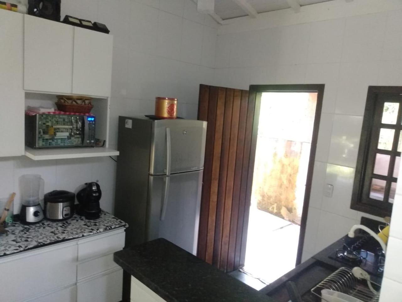 Casa na praia de Camburi em condomínio com piscina aquecida