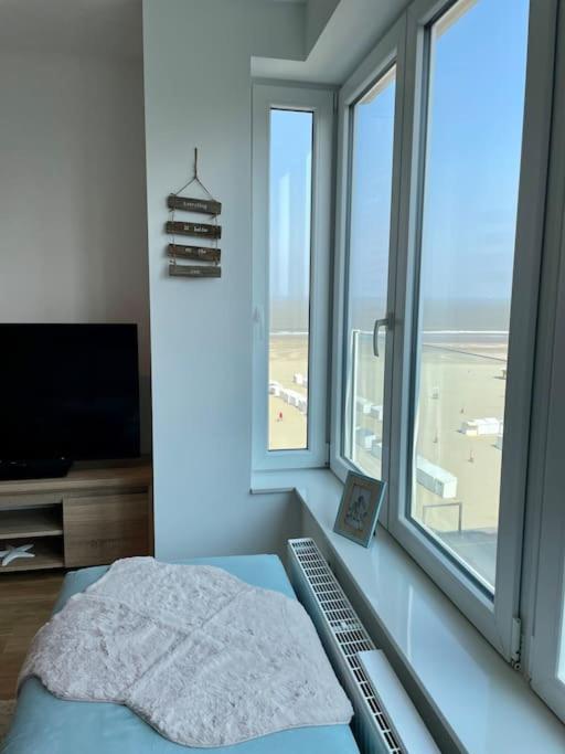 Pierside B, cosy en zeezicht dichtbij Brugge