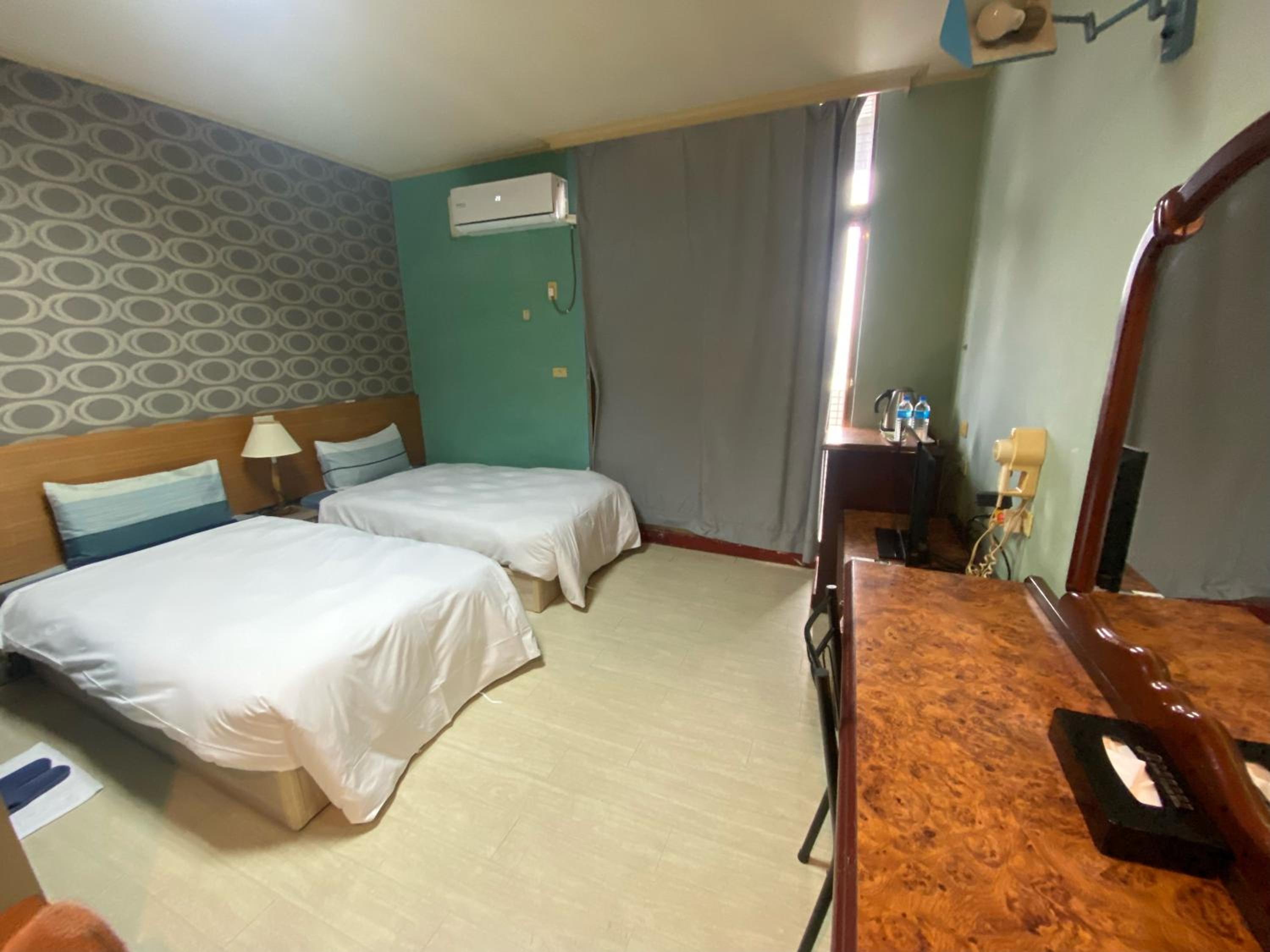 Jiuning Business Hotel