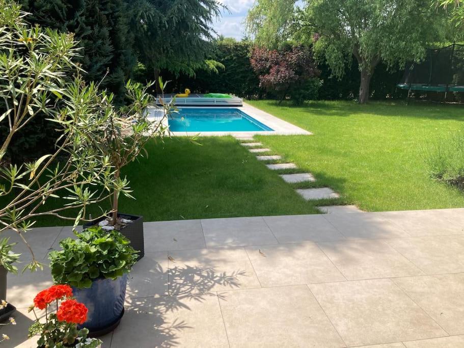 Spacious villa with an outdoor pool in Černošice