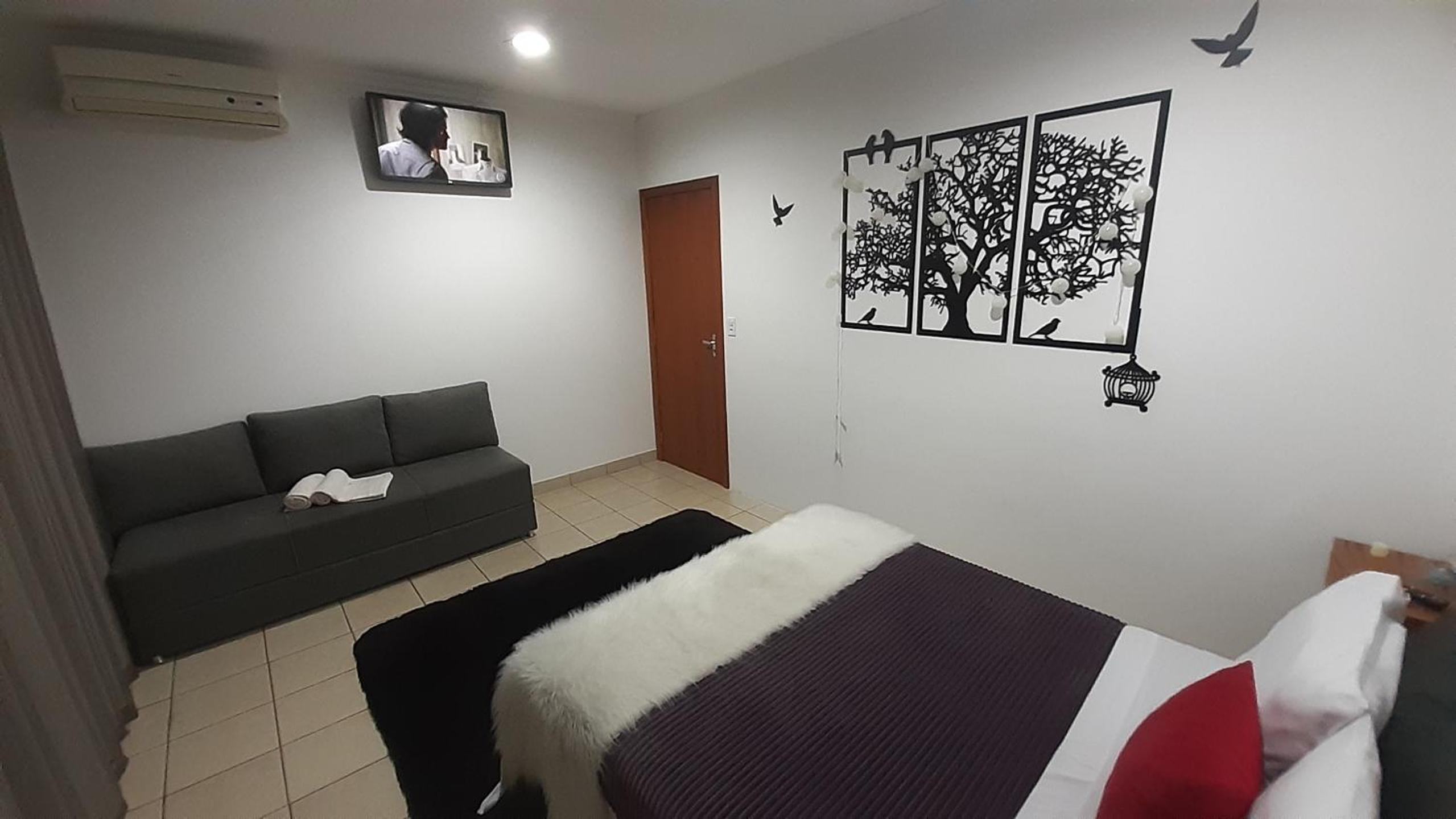 Suite climatizada, ao lado da praca principal