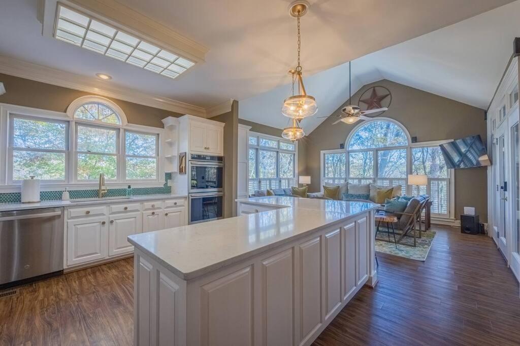 Large Luxury House, King Beds and More, Hot Tub, Theater, Fireplace, Game Room, Ping-pong, Pool Table, Air Hockey, Arcade, River, Big Kitchen, Nice Porch,  view 4