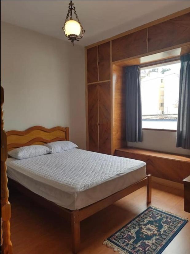 Apartamento Central, quarto andar