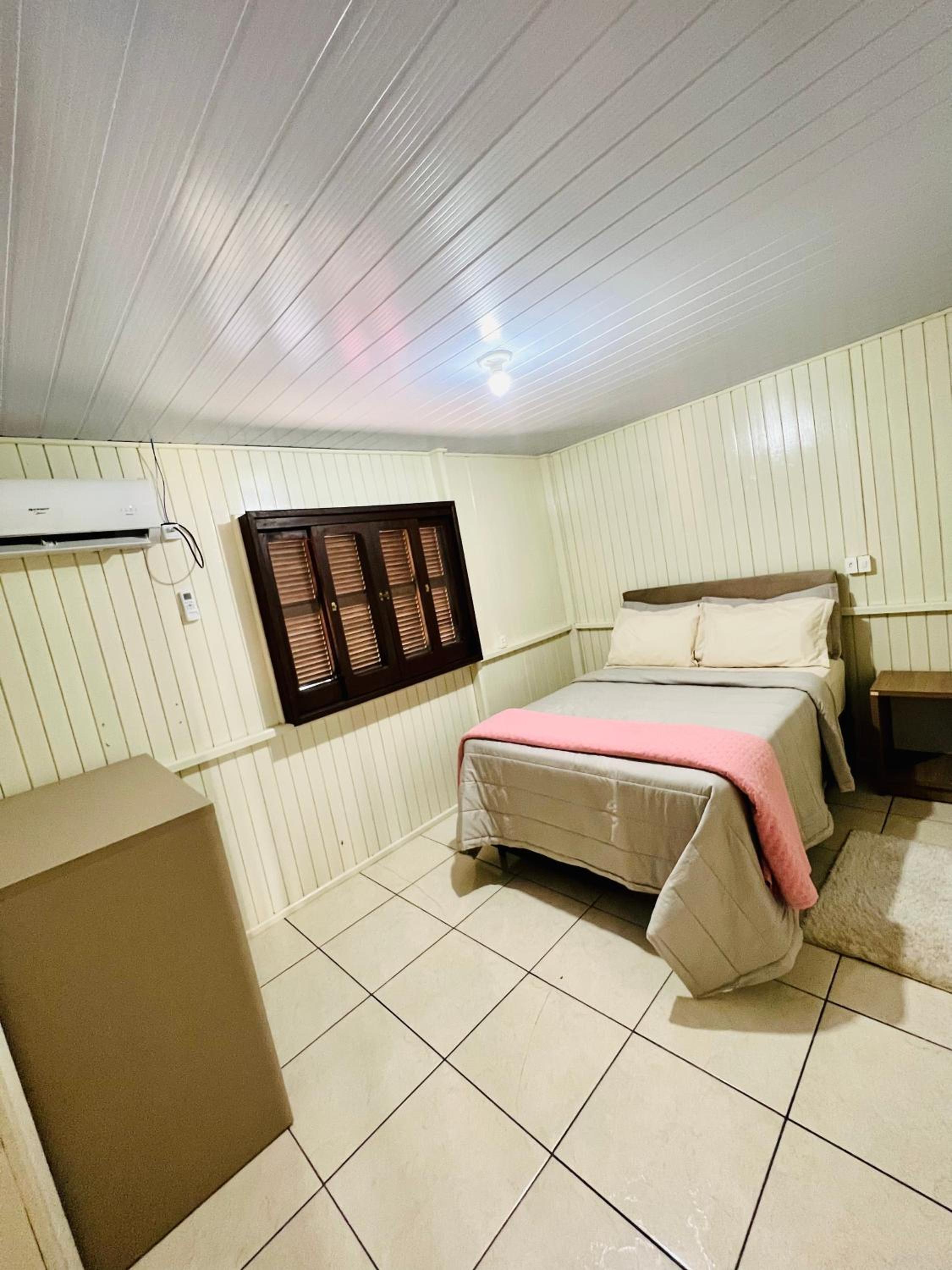 Hospedagem Aconchego da casa Rosa