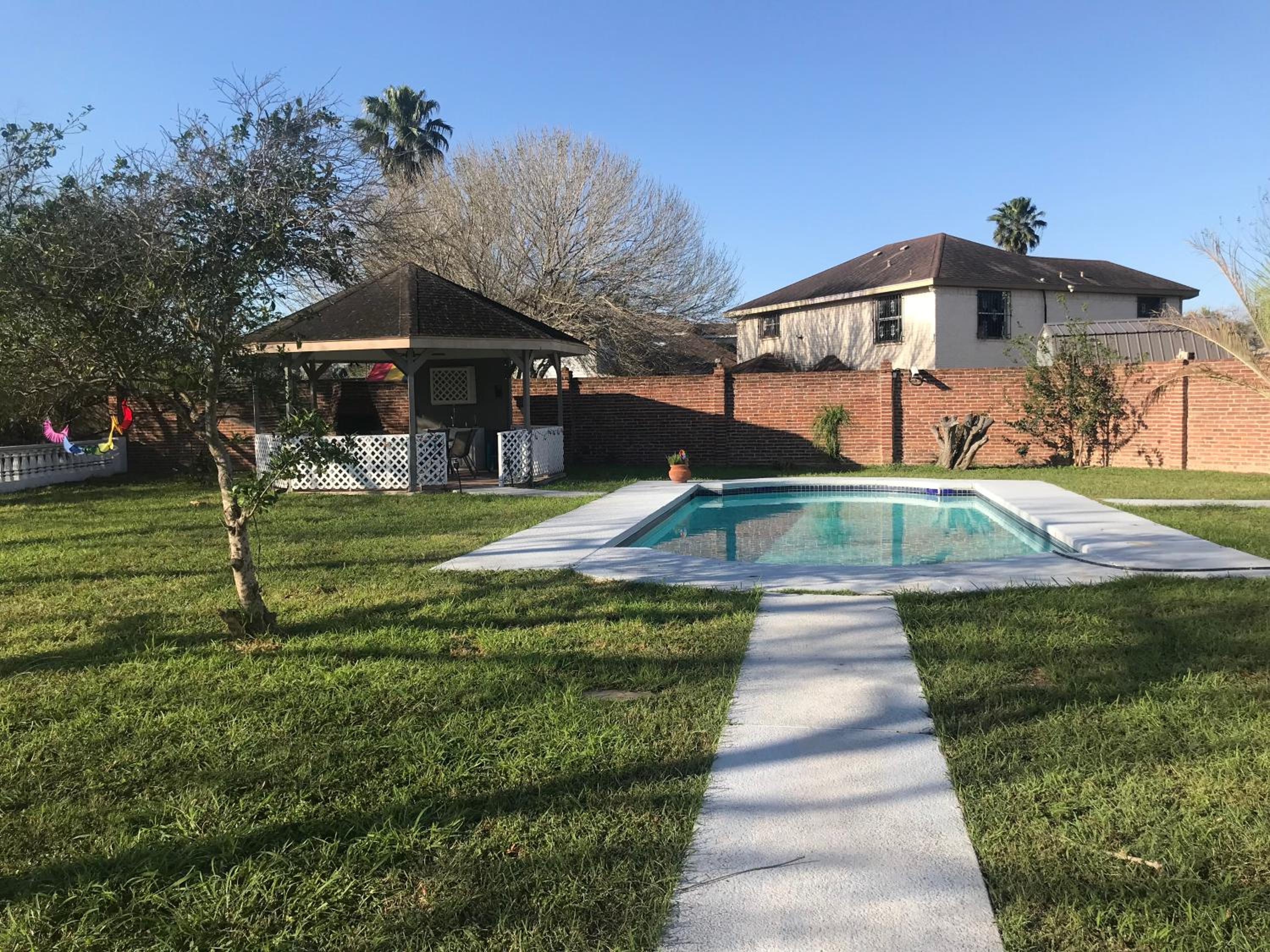 Cheerful 4 bedroom home with pool and BBQ area with 5th bedroom option view 4