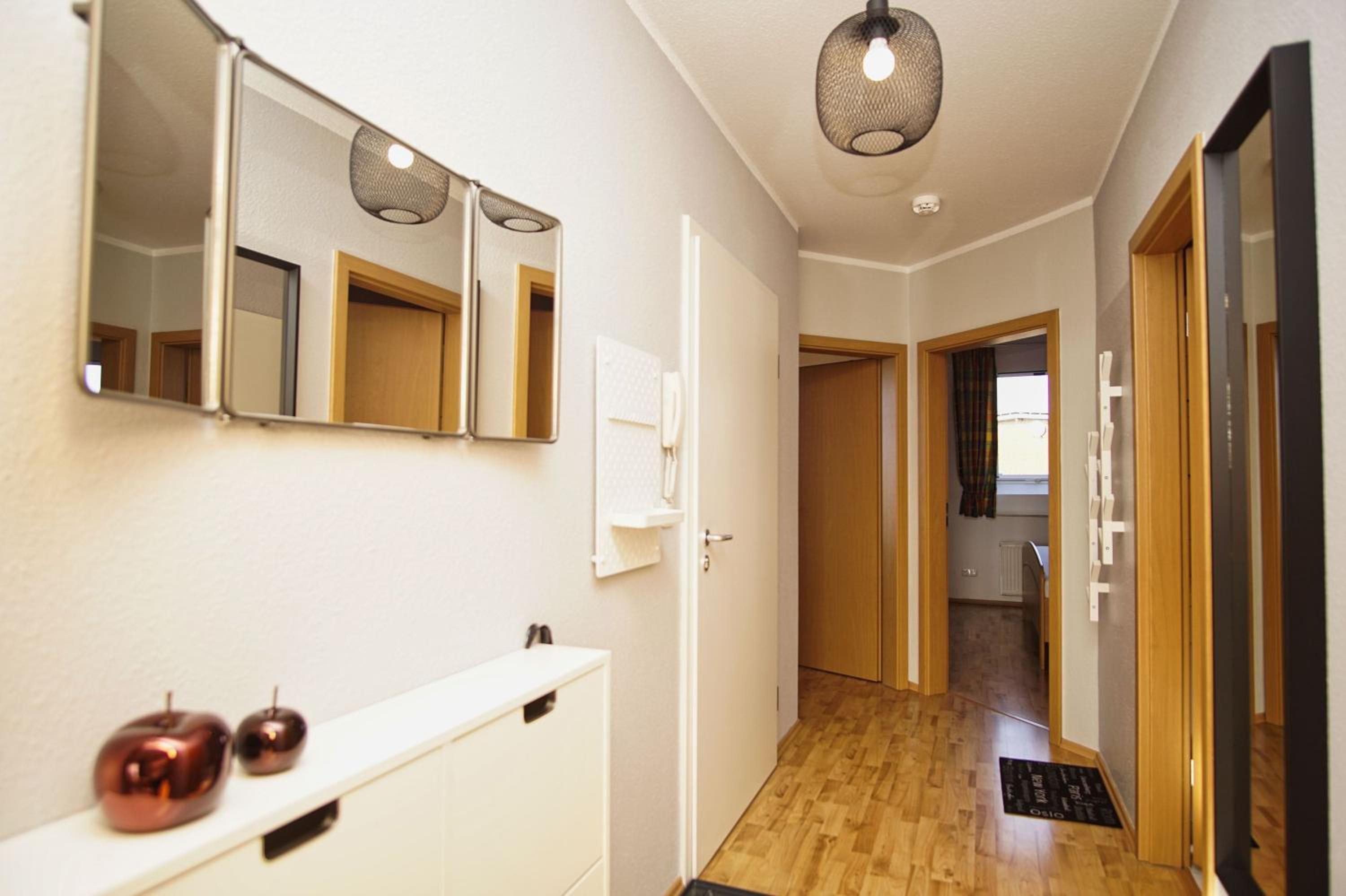 hafennahe Ferienwohnung mit Balkon und Meerblick - Hafenhäuser Breege FeWo 11