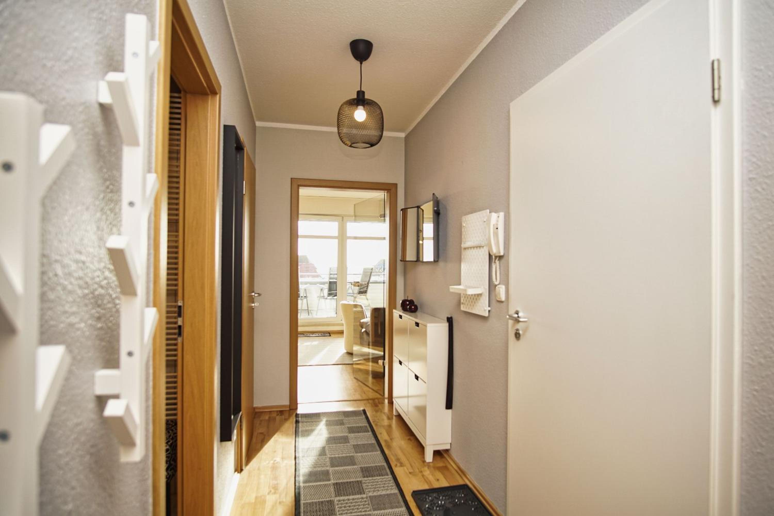 hafennahe Ferienwohnung mit Balkon und Meerblick - Hafenhäuser Breege FeWo 11