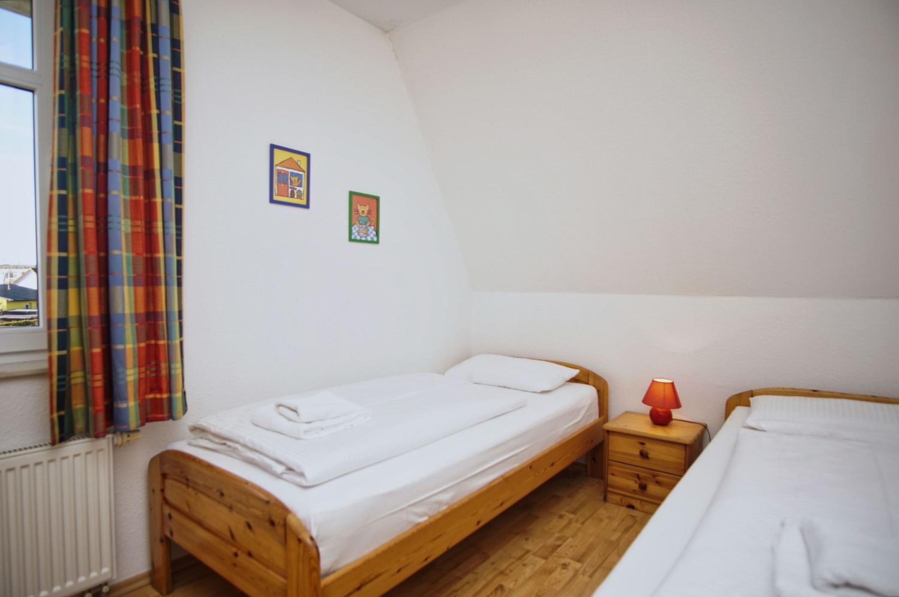 hafennahe Ferienwohnung mit Balkon und Meerblick - Hafenhäuser Breege FeWo 11