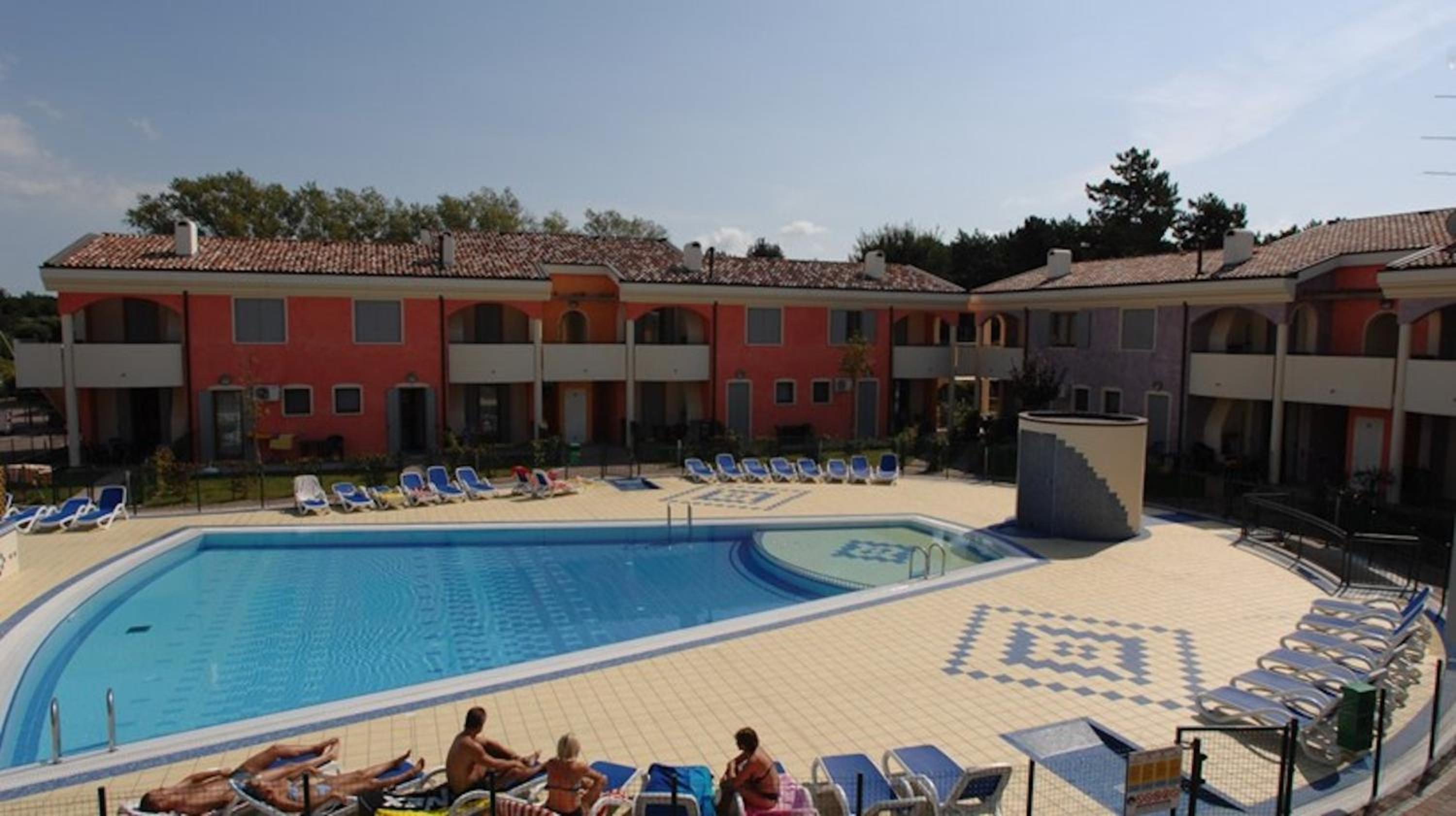 Holiday village escape with garden and fireplace