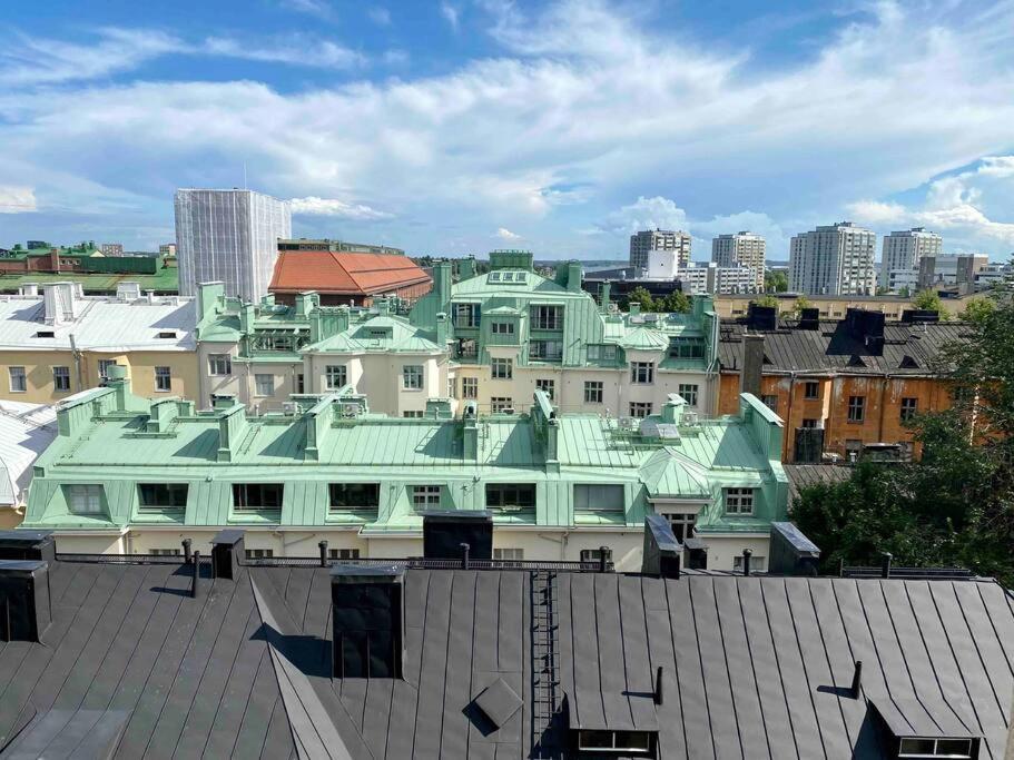 Studio apartment, view over the roofs for the sunrise
