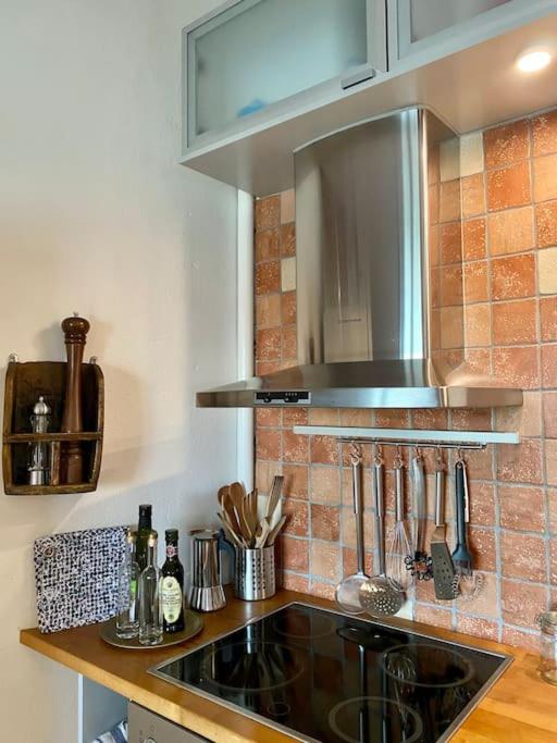 Studio apartment, view over the roofs for the sunrise
