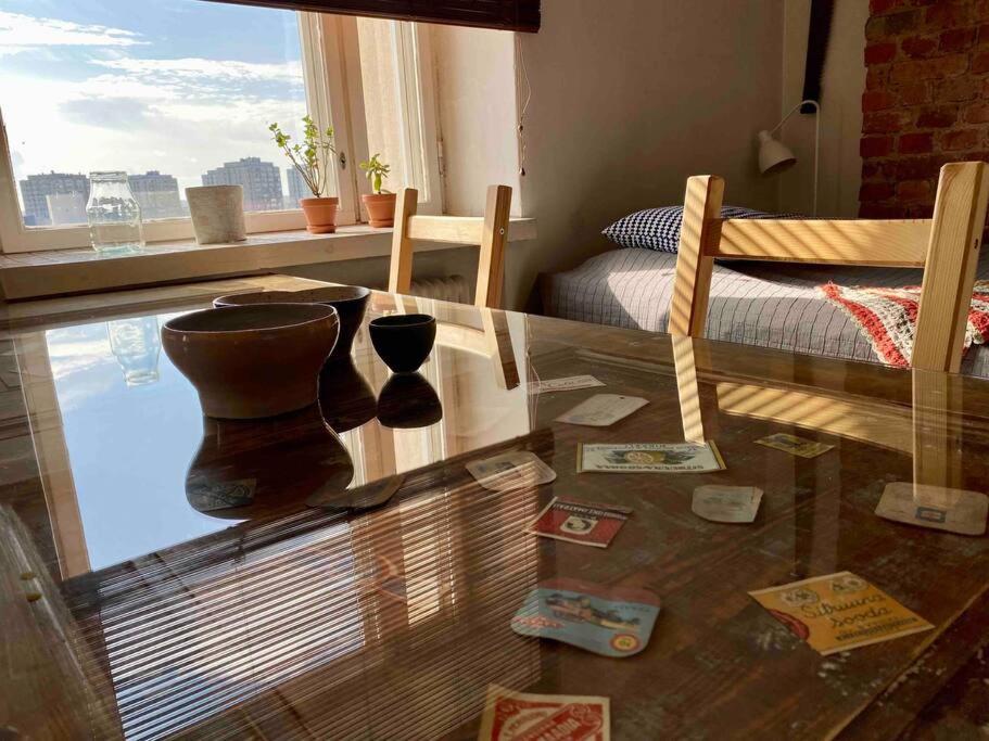 Studio apartment, view over the roofs for the sunrise