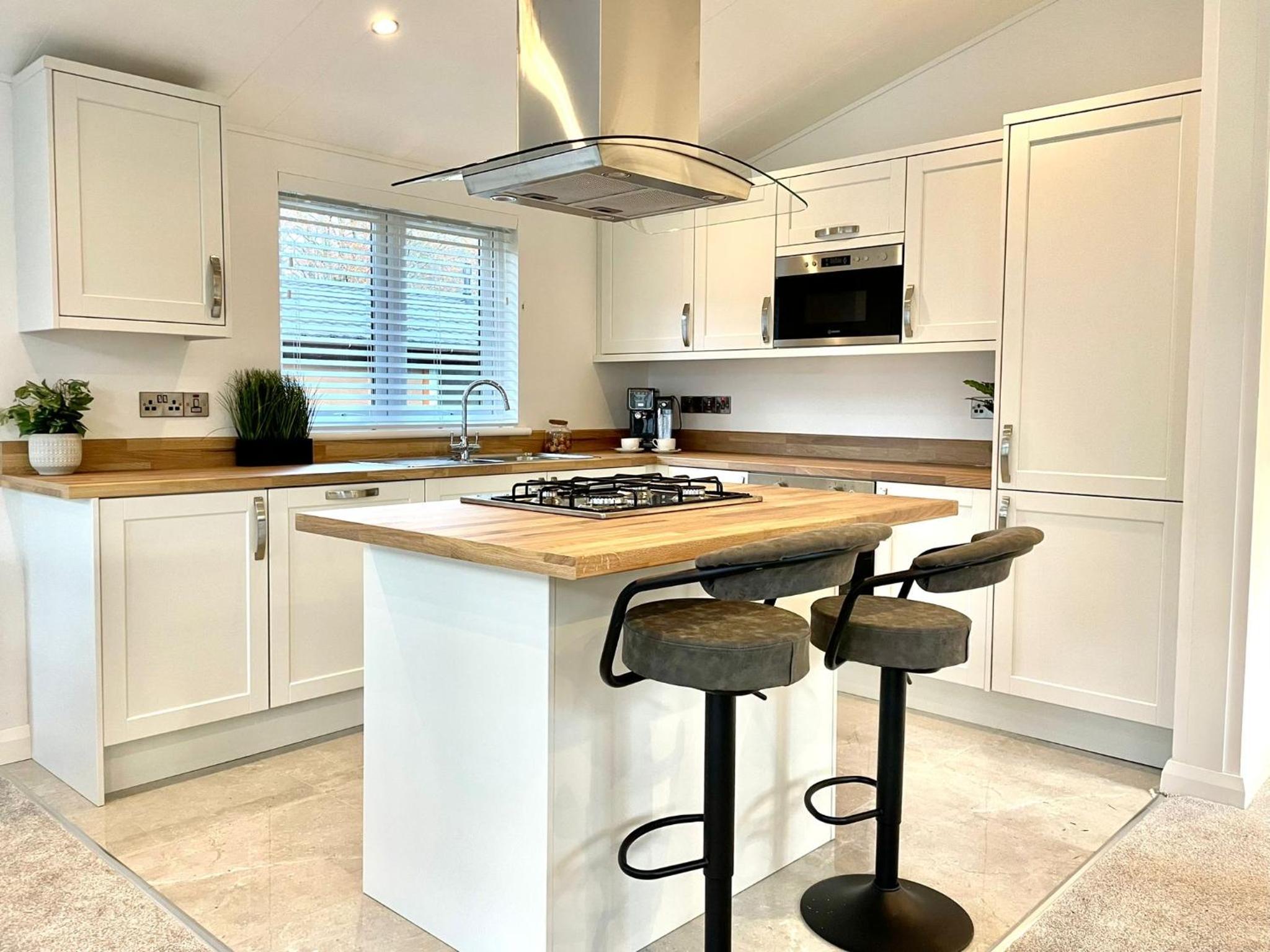 Thirlmere 4 Luxury Lodge at White Cross Bay Windermere view 2
