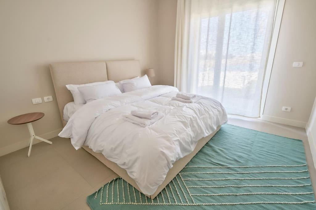 Ground floor two bedrooms in Joubal Lagoon with direct pool access and view view 3