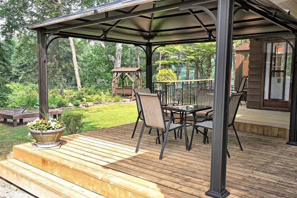 Whispering Pines Riverside Retreat