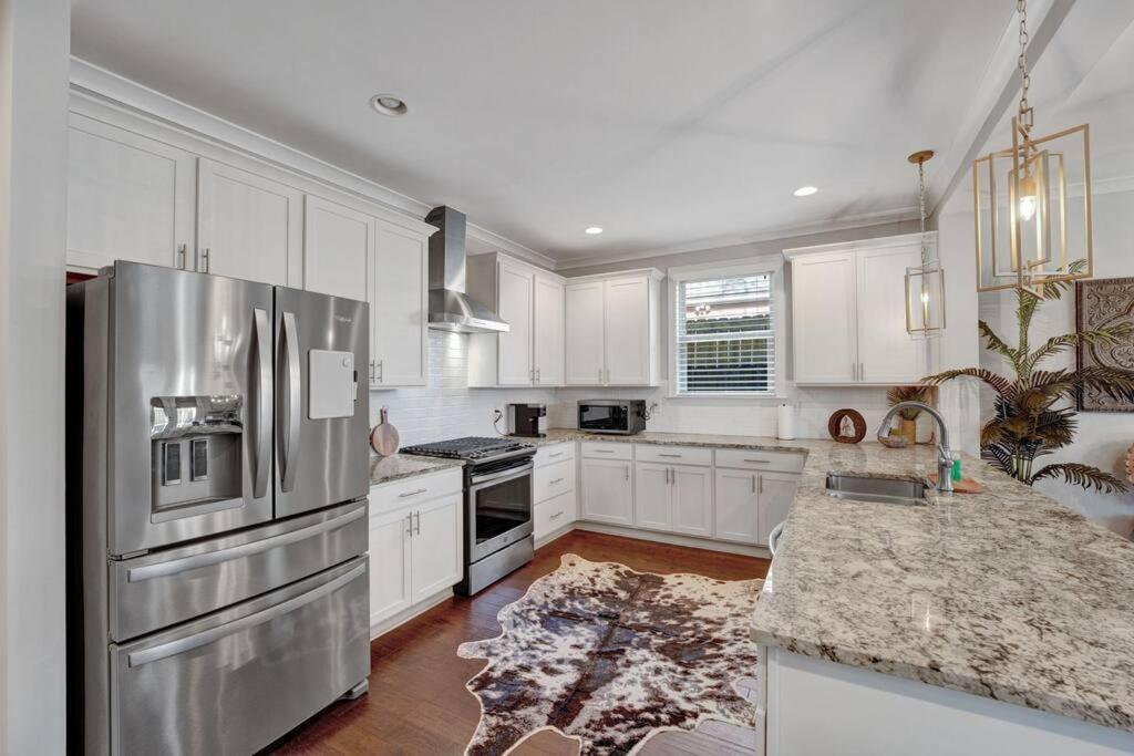 Modern 3-bedroom home with patio and fire pit view 2