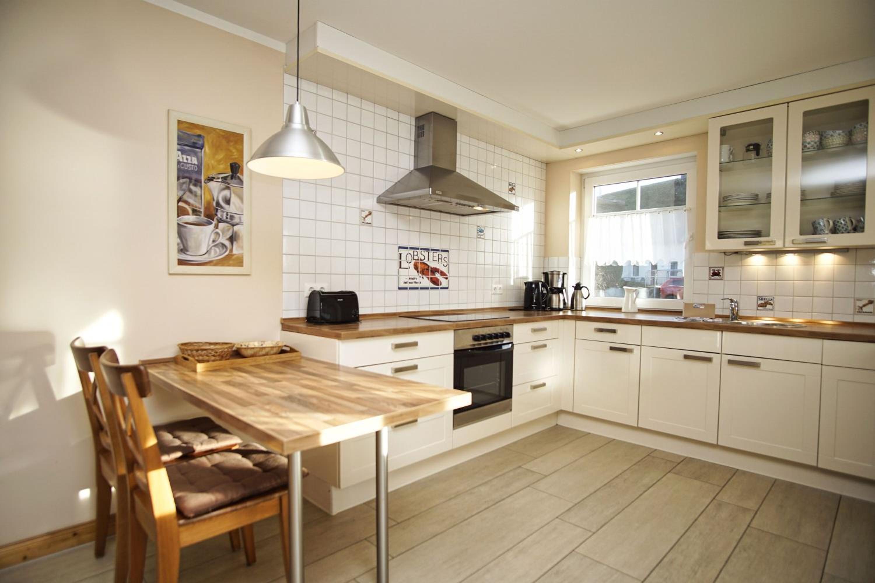 strandnahes Ferienhaus mit überdachter Terrasse und Kamin - Ferienhaus Lobbe