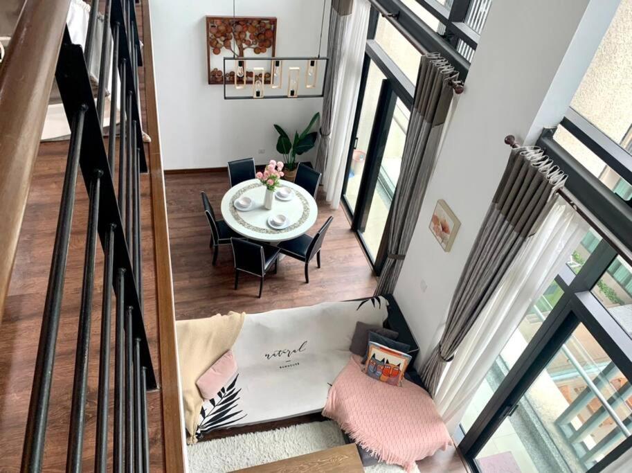 [Nine'suite] @ Riverson Soho - Duplex 2BR Poolview photo 7