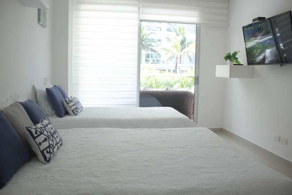 Beachfront Bliss-2BR Haven Steps from Sandy Shores