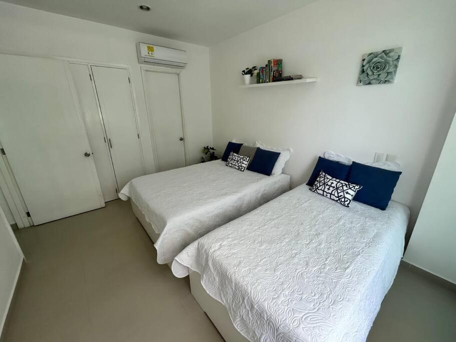 Beachfront Bliss-2BR Haven Steps from Sandy Shores