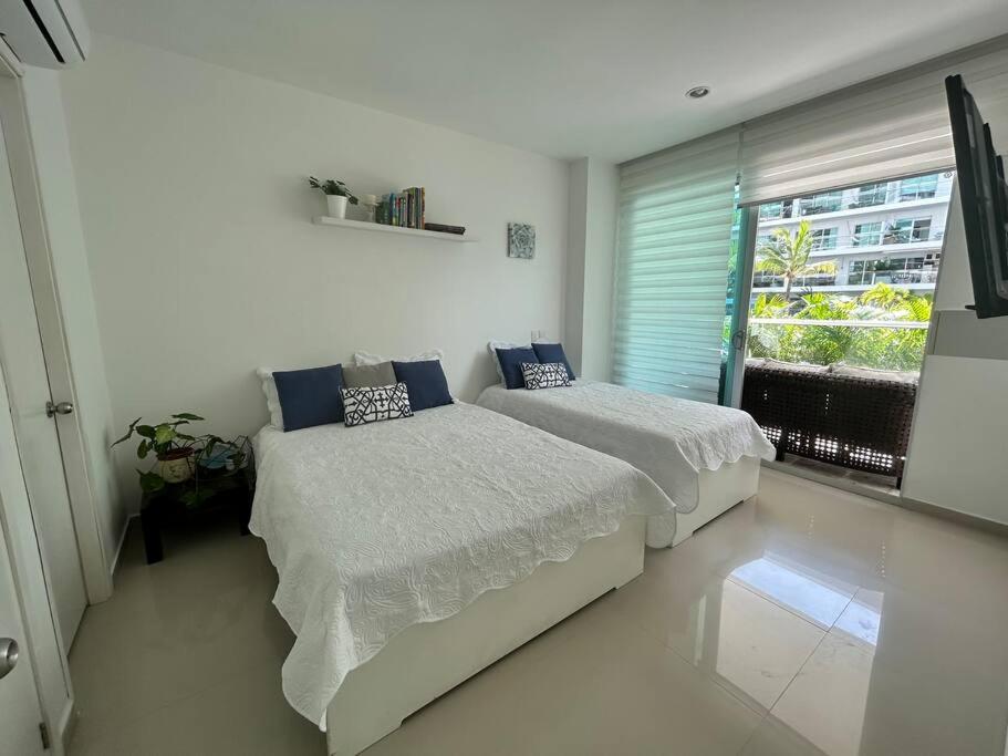 Beachfront Bliss-2BR Haven Steps from Sandy Shores