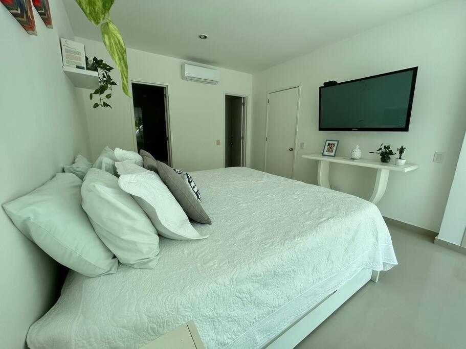 Beachfront Bliss-2BR Haven Steps from Sandy Shores