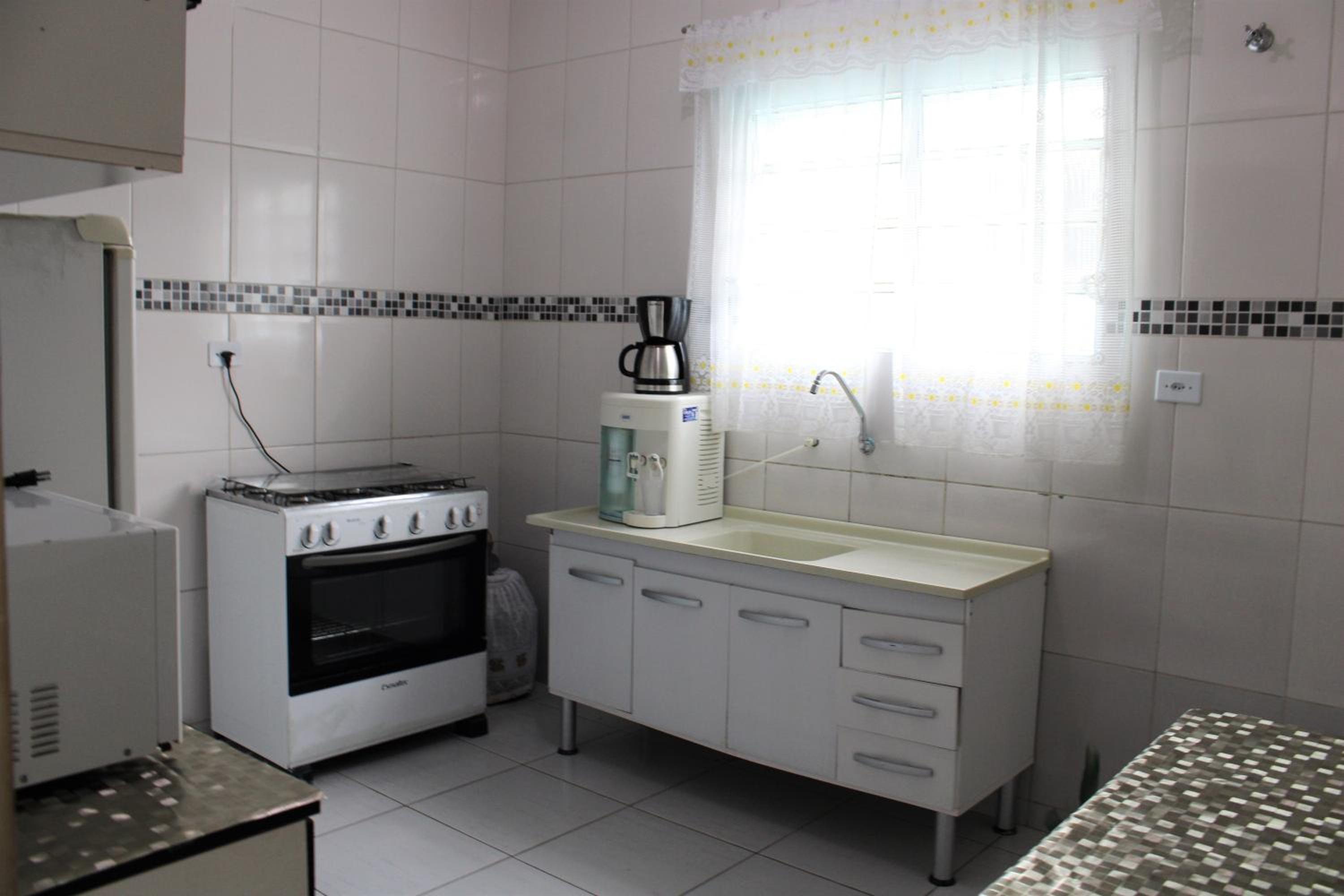 Casa com piscina à beira-mar