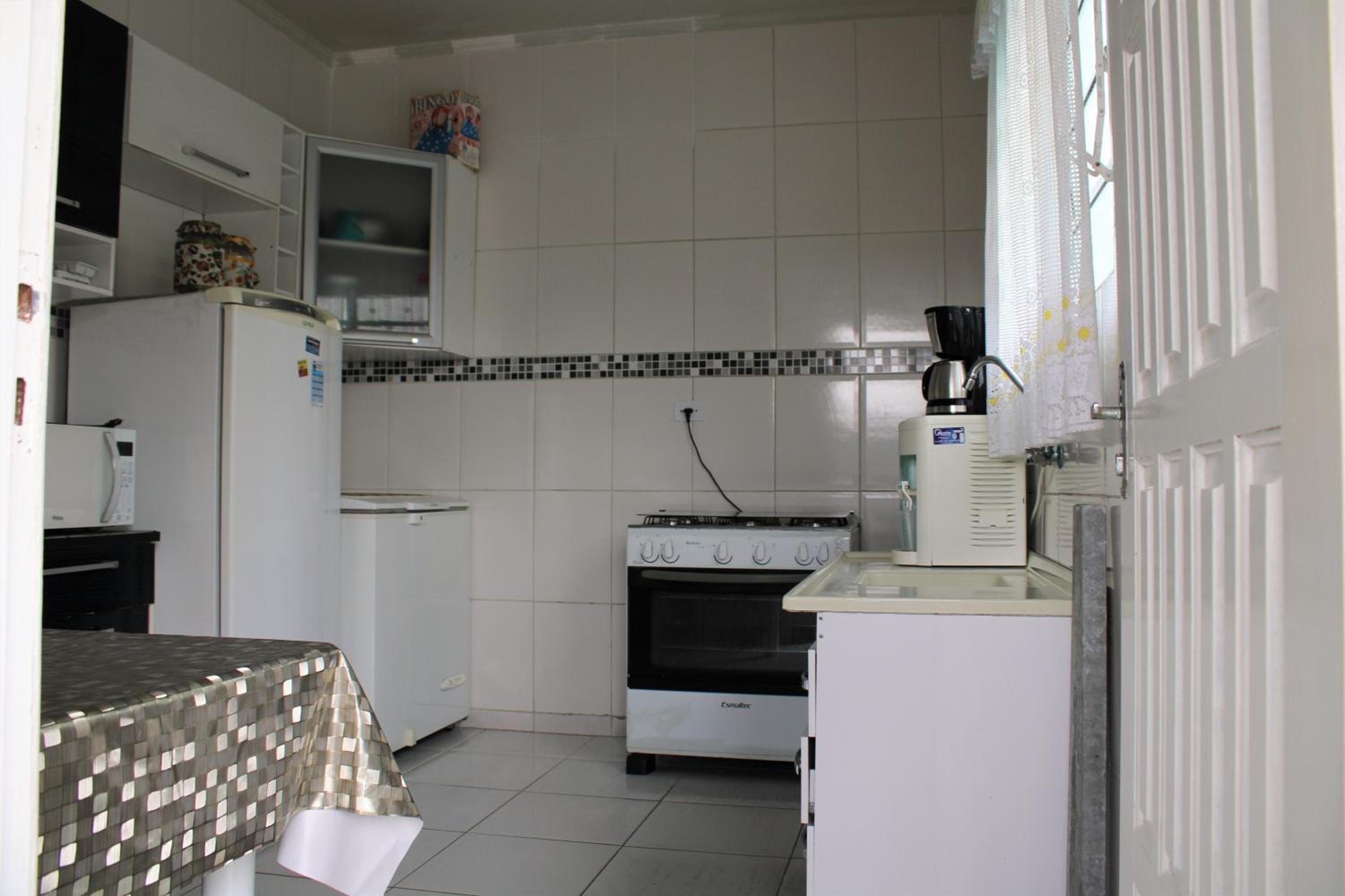 Casa com piscina à beira-mar
