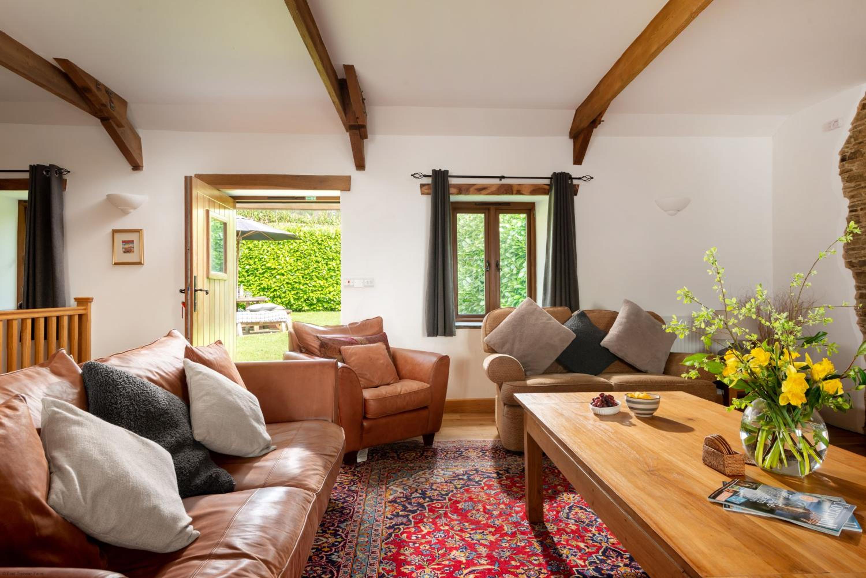 Corn Barn at East Trenean Farm -Luxury Cornish Barn Conversion sleeping 8 with hot tub, private garden, rural views and EV facilities view 5