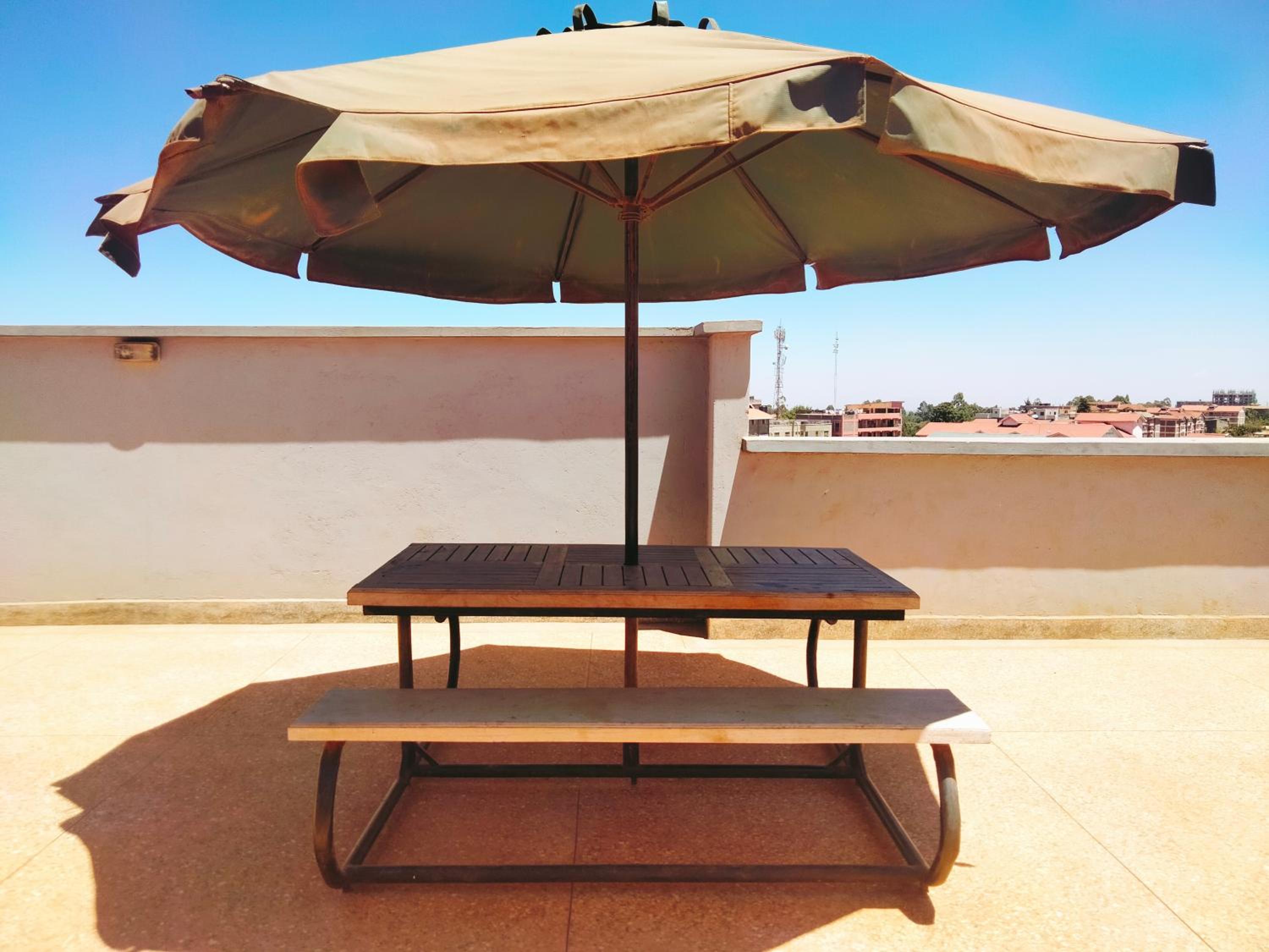 Pine Residency w Secure Parking, Wifi, Netflix & Rooftop Views view 5