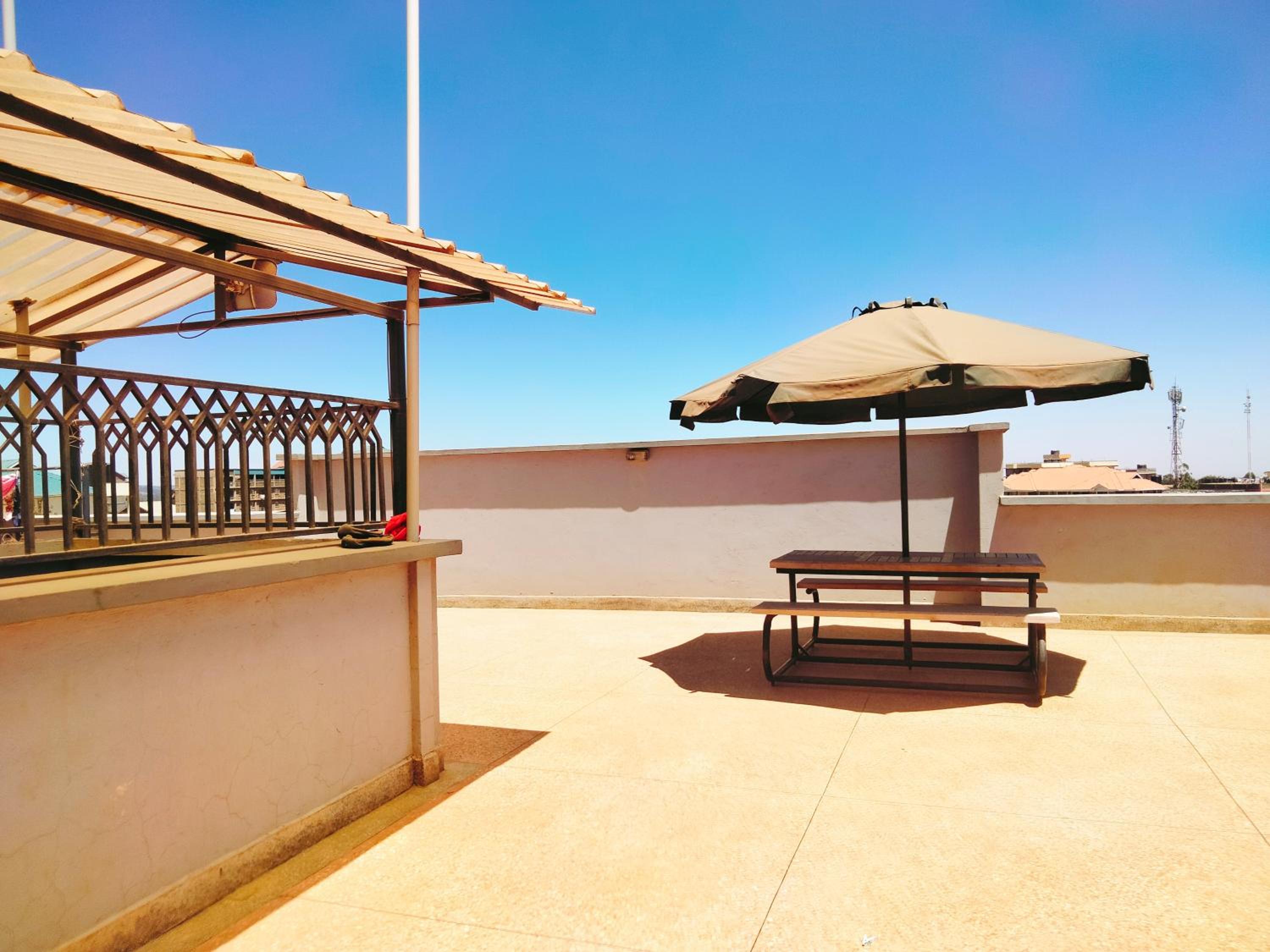 Pine Residency w Secure Parking, Wifi, Netflix & Rooftop Views view 4