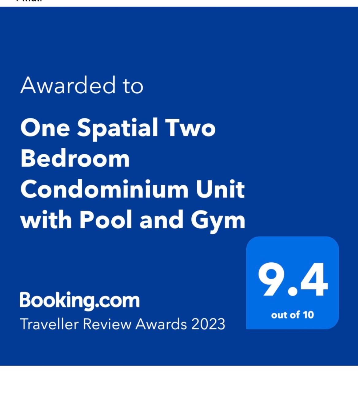 One Spatial Two Bedroom Condominium Unit with Pool and Gym free Netflix and wifi view 3
