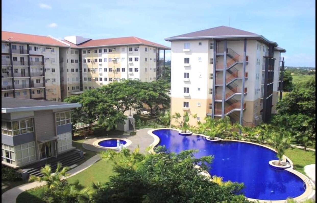 Amaia Steps Nuvali fully furnished unit with swimming pool view near Carmelray Pitland