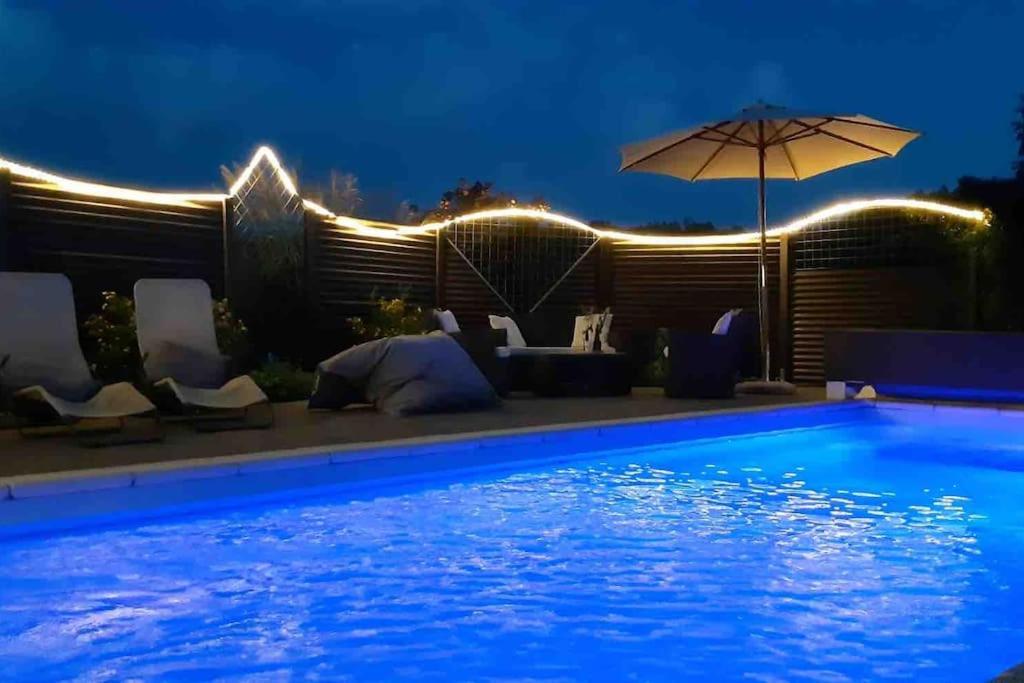 Appartement mit Alpensicht, beheiztem Pool, Garten