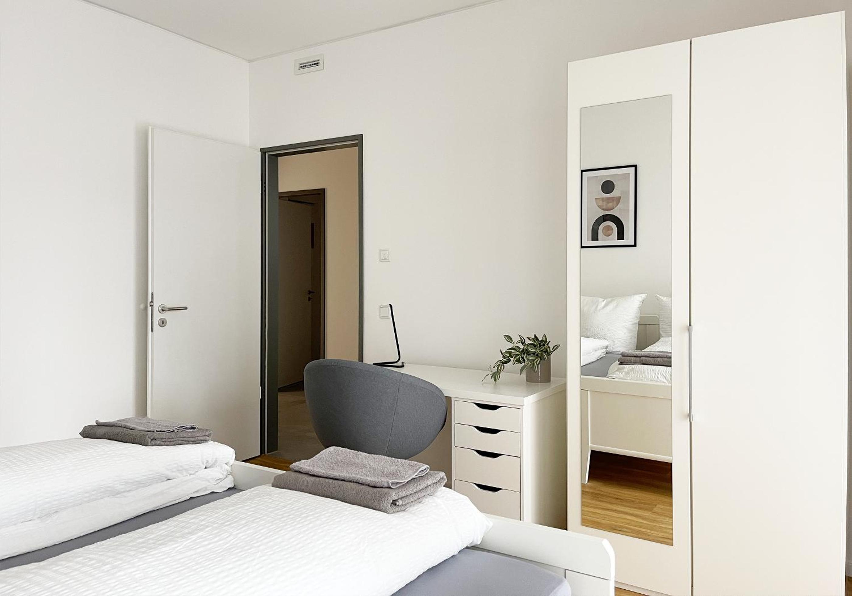 Moderne Apartments im Herzen der Stadt I private Tiefgarage mit Ladesäulen I home2share