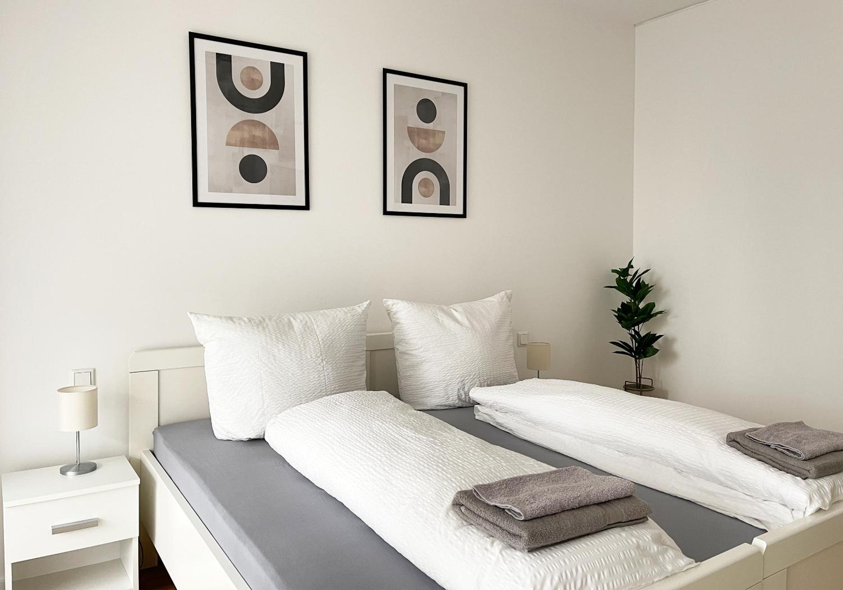 Moderne Apartments im Herzen der Stadt I private Tiefgarage mit Ladesäulen I home2share