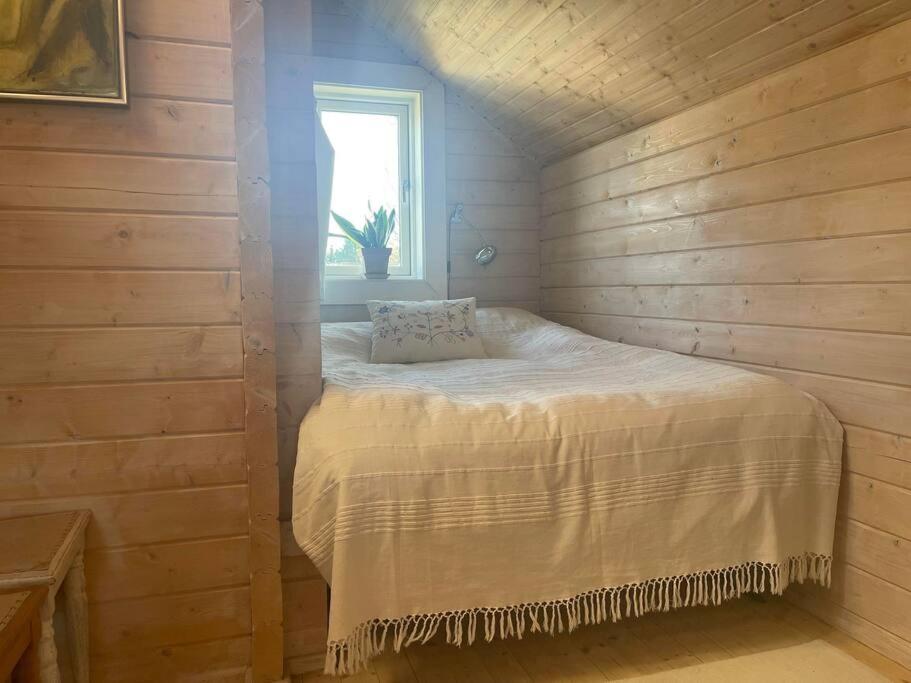 Hyggeligt og lyst feriehus nær stranden i Klint