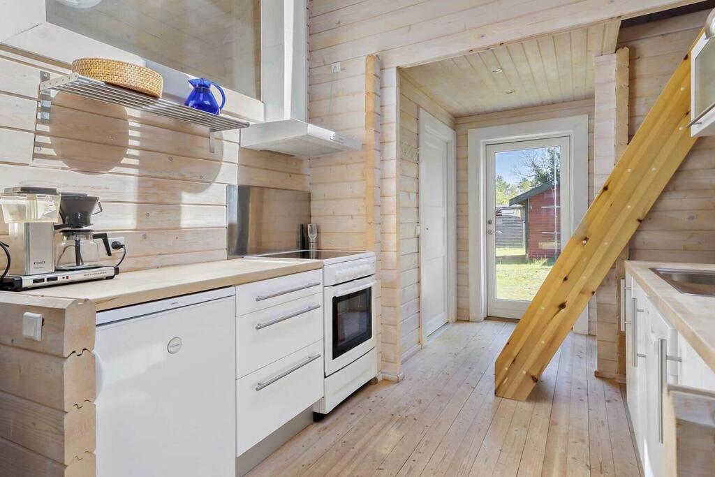 Hyggeligt og lyst feriehus nær stranden i Klint