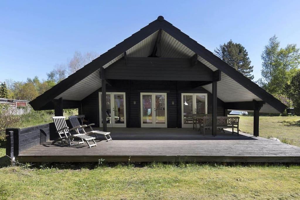 Hyggeligt og lyst feriehus nær stranden i Klint